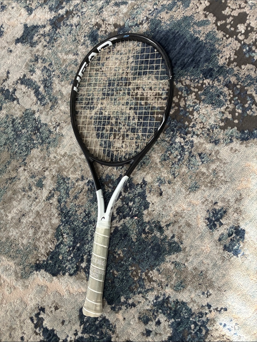 Head Tennis Racket in Black and White
